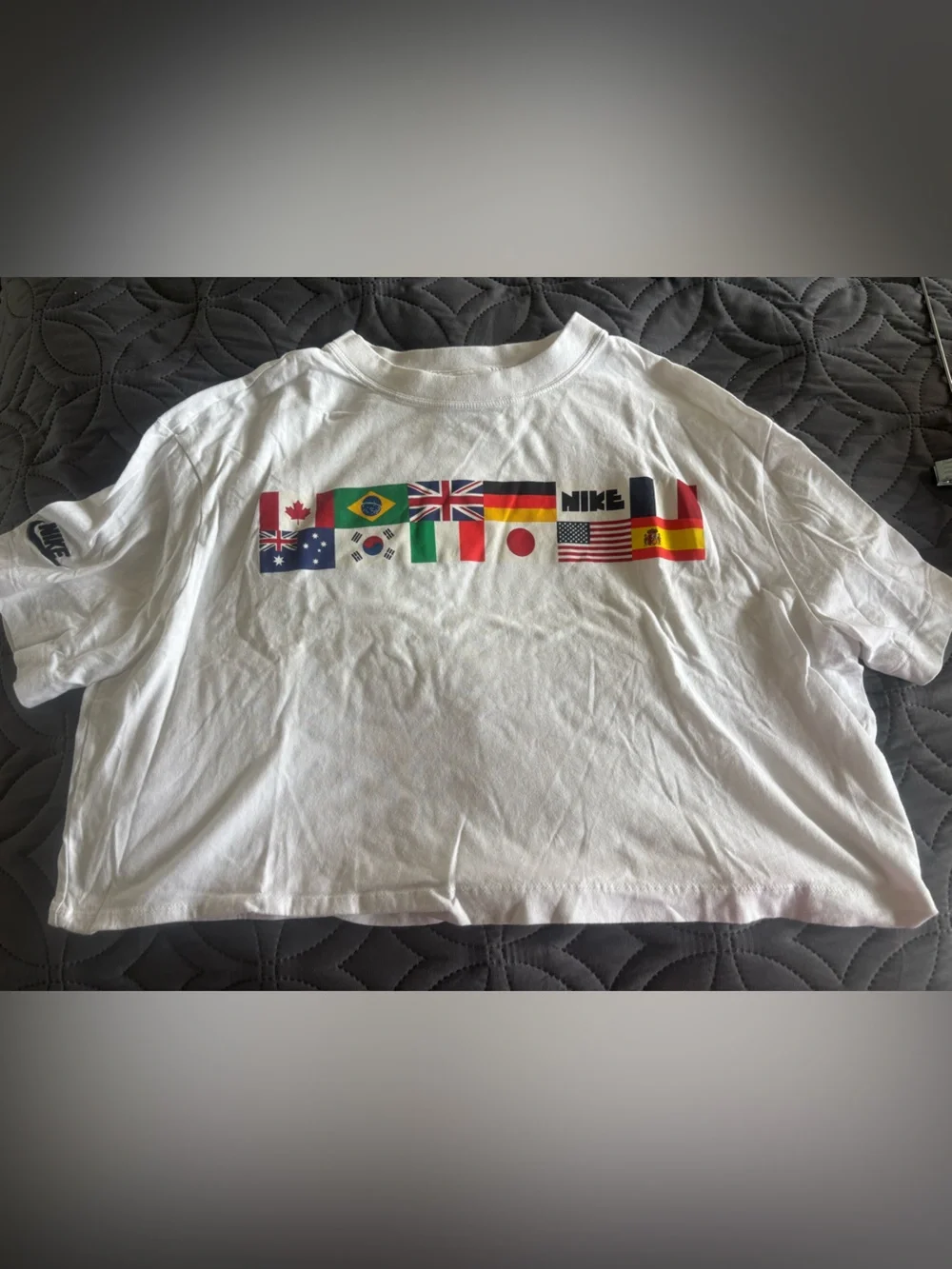 Nike White Crop Top with Multicolor Flag Graphics